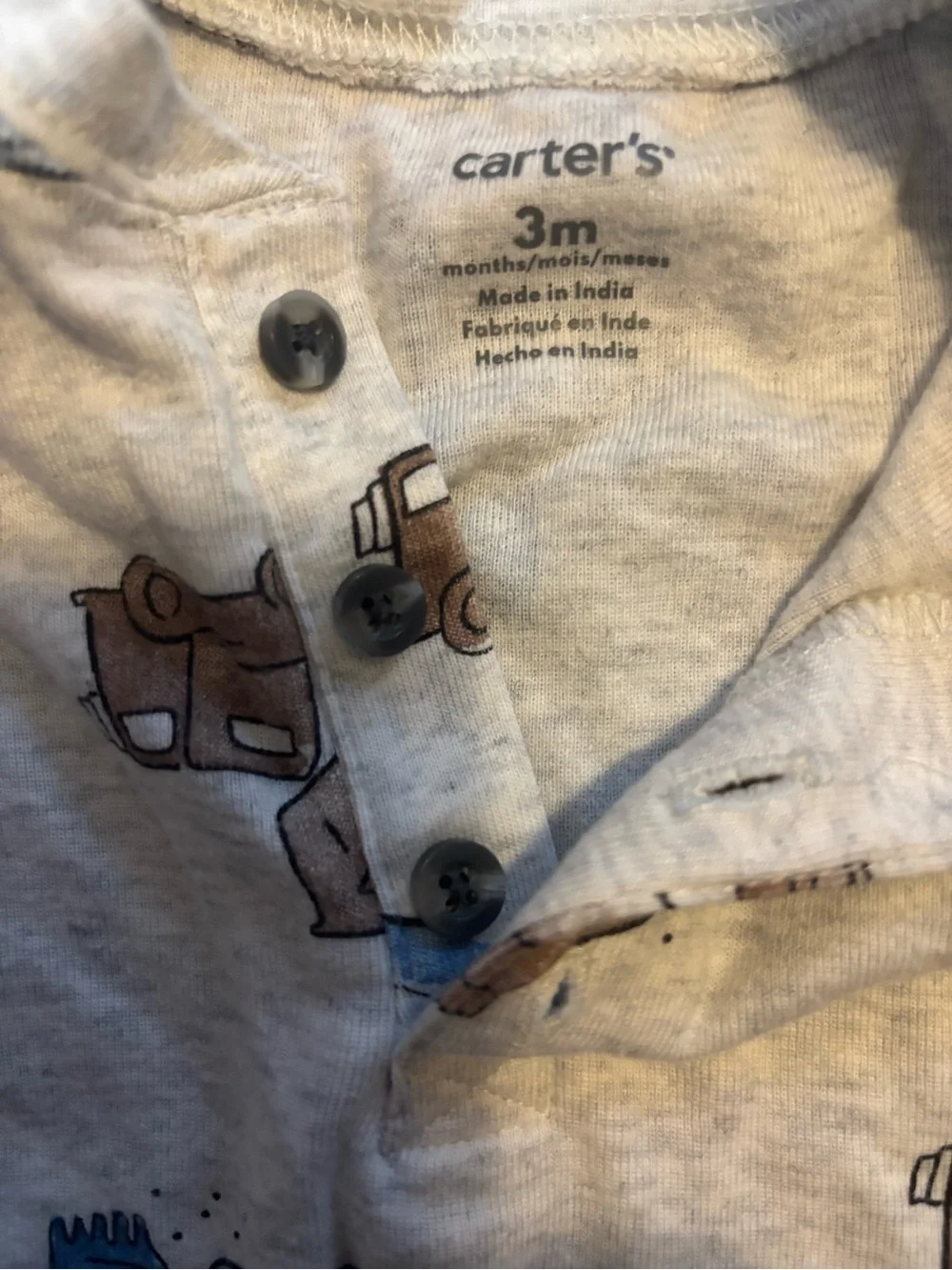 2 Carter's onesies with Construction Vehicles